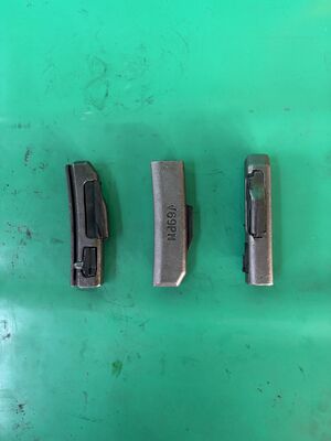 खुदाई करने वाले स्पेयर पार्ट्स बाल्टी दांत सहायक उपकरण एडाप्टर लॉक पिन V69PN